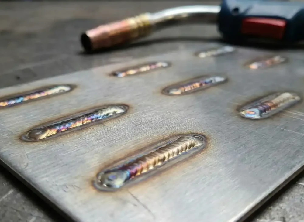 What Causes Welding Spots to Turn Elliptical When Lenses Heat