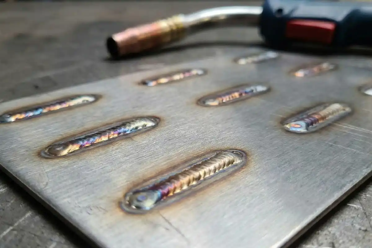 What Causes Welding Spots to Turn Elliptical When Lenses Heat