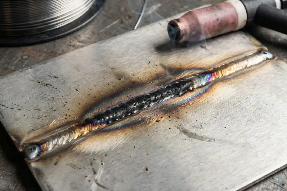 Why do stainless steel weld seams turn black